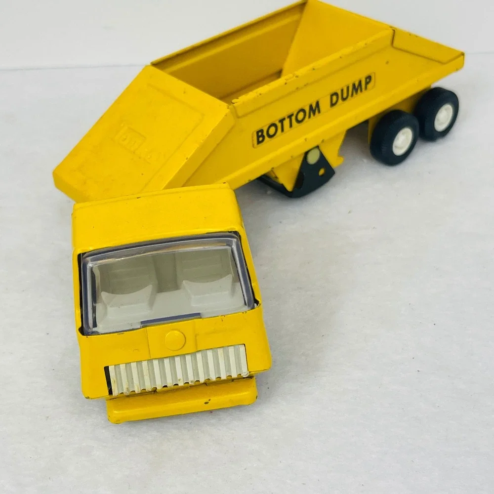 Vintage Tonka Bottom Dump Truck Yellow Pressed Steel Toy Construction Vehicle